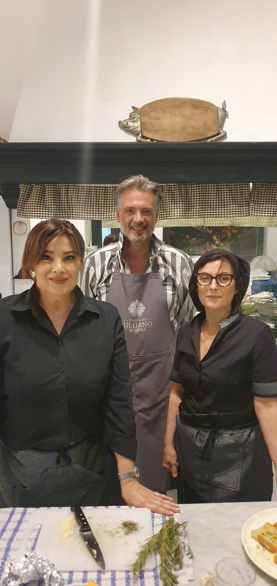 Chef in Tuscany team portrait in the kitchen